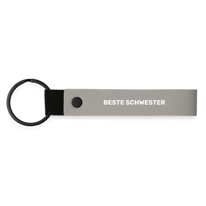 Schlüsselanhänger "Beste Schwester" - Hellgrau